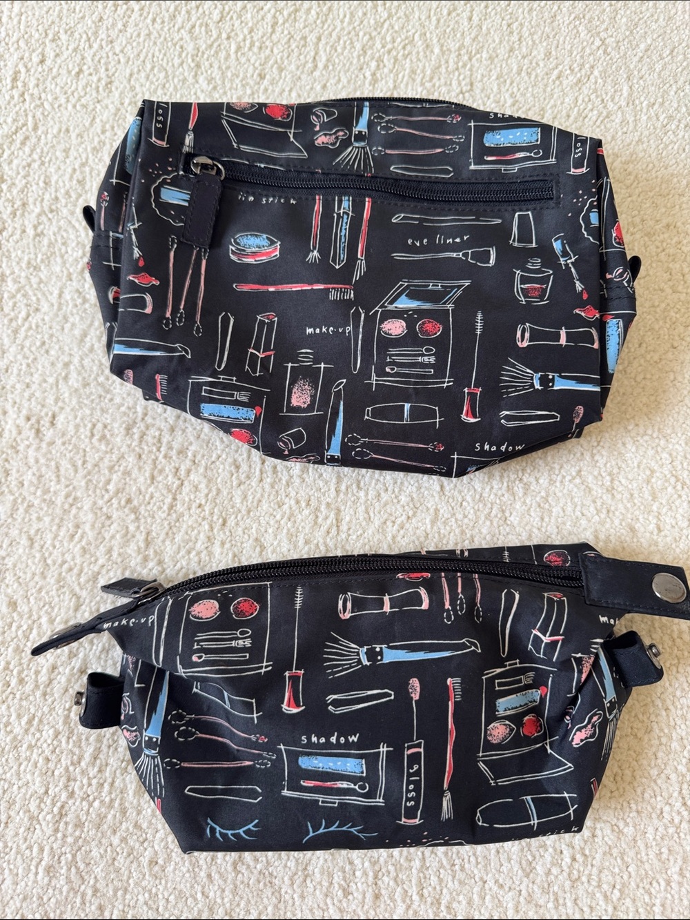 Nicole Miller Black Cosmetic Bag Set with Red and Blue Makeup Print
